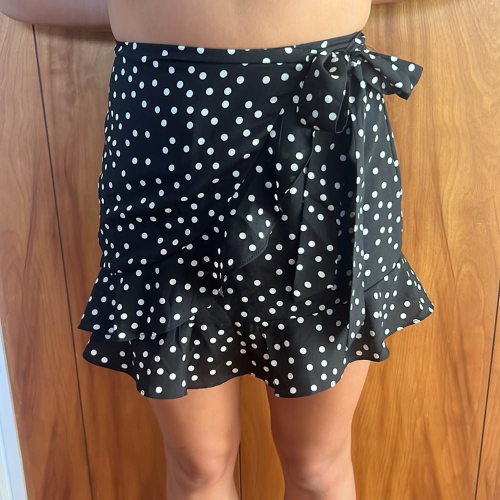 Black and white polka dot mini skirt